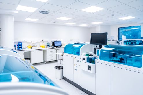 Modern laboratory facility with laboratory equipment and analytical instruments.